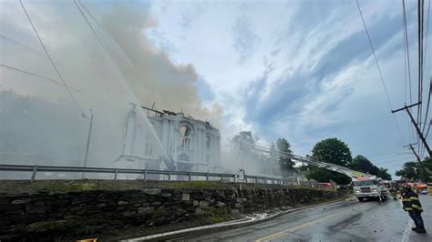 Fire topples steeple, destroys historic church in Spencer